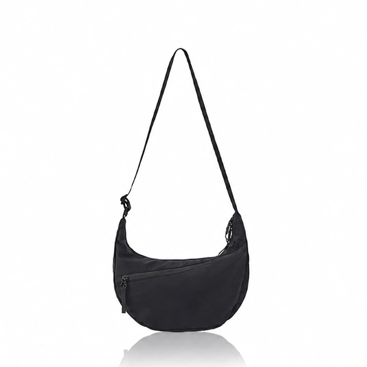 Black crescent crossbody bag with an adjustable shoulder strap on a white background